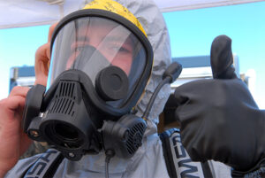 man in PPE giving thumbs up